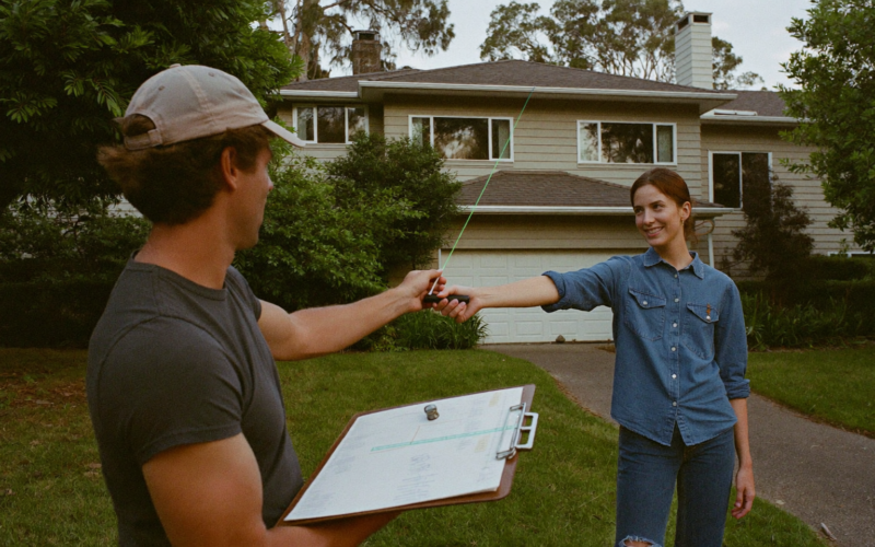 Flooring estimator greeted at the door for an in-home measure, reducing flooring measure no-shows